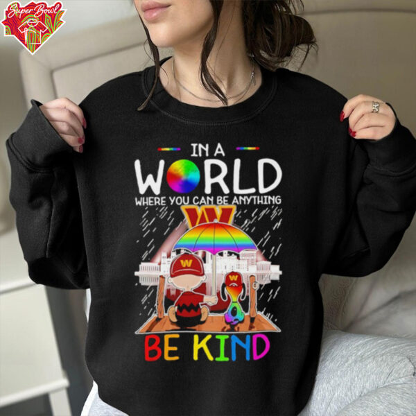 Skyline Snoopy and Charlie Brown in world where you can be anything Washington Commanders shirt