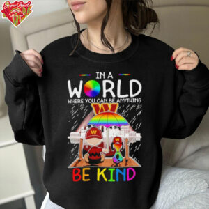 Skyline Snoopy and Charlie Brown in world where you can be anything Washington Commanders shirt