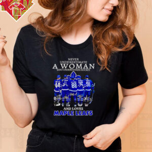 Never underestimate a woman who understands hockey and loves Maple Leafs signatures shirt